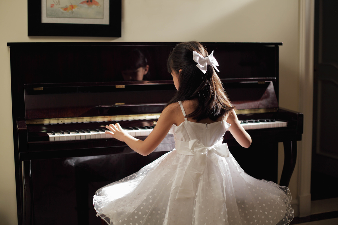 Girl Playing Piano