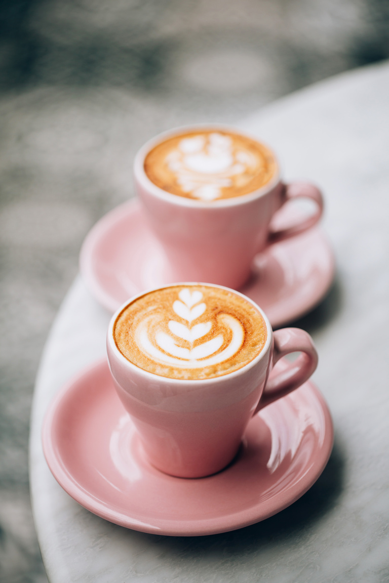 Two cups of cappuccino.